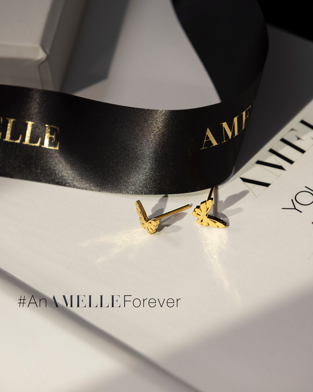 AMELLE Logo Studs 01 - Permanent Collection